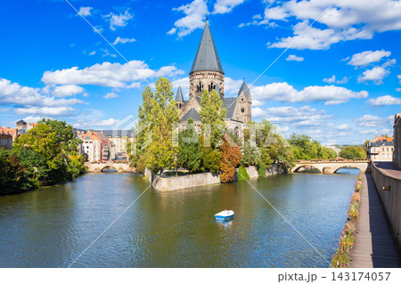Temple Neuf or New Temple church and Moselle river in Metz, France. Temple Neuf or New Temple church and Moselle river in Metz, France. 143174057