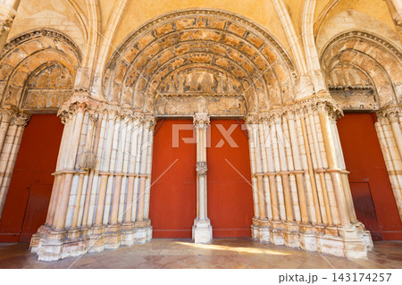 Ornate portal doors of Notre Dame Church porch in Dijon, France Ornate portal doors of Notre Dame Church porch in Dijon, France 143174257