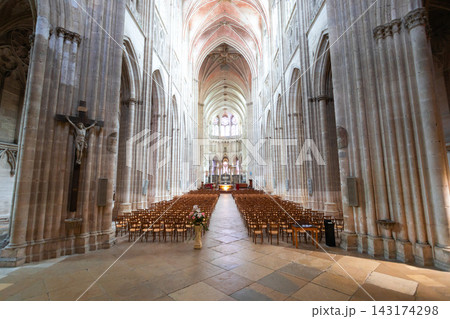 Interior view of Saint Etienne Cathedral in Auxerre city, France Interior view of Saint Etienne Cathedral in Auxerre city, France 143174298