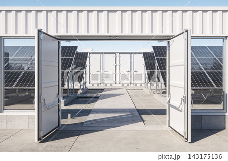 Modern solar energy storage facility with open container doors and rows of photovoltaic panels Modern solar energy storage facility with open container doors and rows of photovoltaic panels 143175136