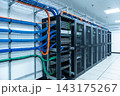 Modern server room with organized network cabling and rack mounted hardware infrastructure 143175267