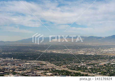 Sunny views of the Salt Lake Valley and Wasatch Range from atop Ensign Peak. Sunny views of the Salt Lake Valley and Wasatch Range from atop Ensign Peak. 143176924