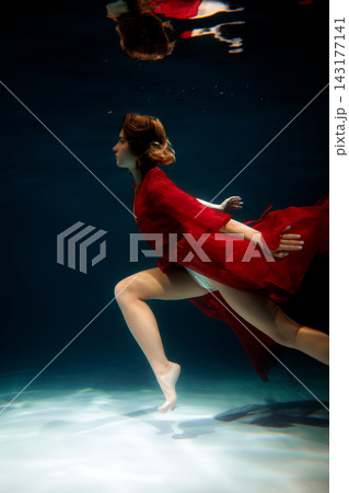 Calm underwater scene with reflective ambiance and soft glow 143177141