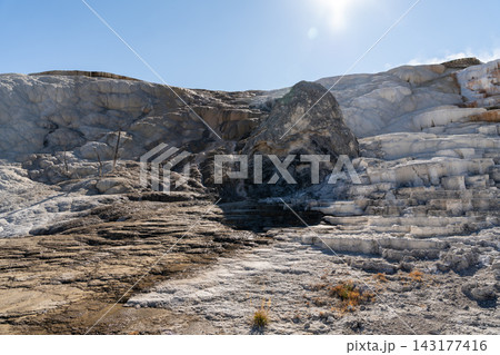 Views of Mammoth Hot Springs on a sunny day at Yellowstone National Park. Views of Mammoth Hot Springs on a sunny day at Yellowstone National Park. 143177416