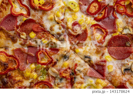 Delicious Mixed Pizza with Assorted Toppings.  143178624