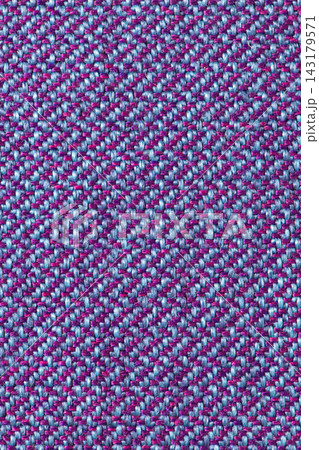 Close up of a blue and purple woven fabric texture background Close up of a blue and purple woven fabric texture background 143179571