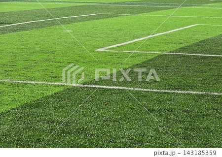 artificial green grass background for playground 143185359