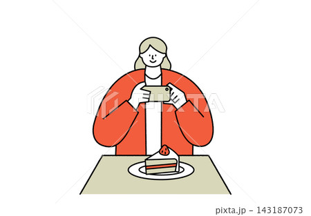 ケーキを撮影する女性 ケーキを撮影する女性 143187073