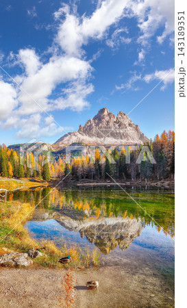 Amazing view of popular travel destination mountain lake Antorno in autumn. Location: Antorno lake, Dolomiti alps, Province of Belluno, Italy, Europe Amazing view of popular travel destination mountain lake Antorno in autumn. Location: Antorno lake, Dolomiti alps, Province of Belluno, Italy, Europe 143189351