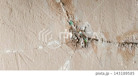 Close-Up View of Cracked and Water-Damaged Concrete Wall Texture Close-Up View of Cracked and Water-Damaged Concrete Wall Texture 143189585