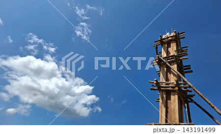 Wooden Pillar Formwork Construction under Blue Sky and Cloud 143191499