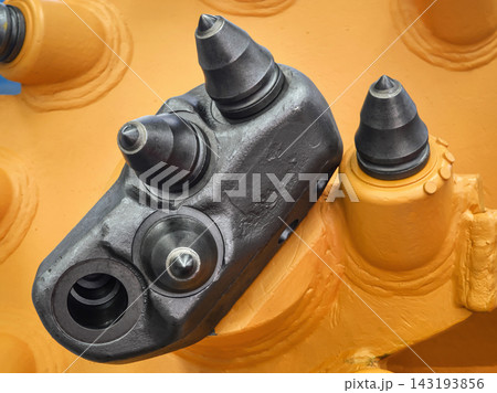 Close-up view of a drill head used in construction and mining activities 143193856