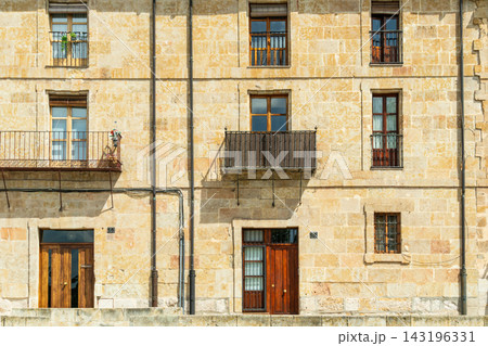 Facade of a historic stone building in Salamanca, Spain 143196331