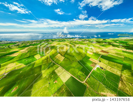 Pico Dona Joana and Patchwork Fields on Sunny Day. Terceira Island, Azores Pico Dona Joana and Patchwork Fields on Sunny Day. Terceira Island, Azores 143197658