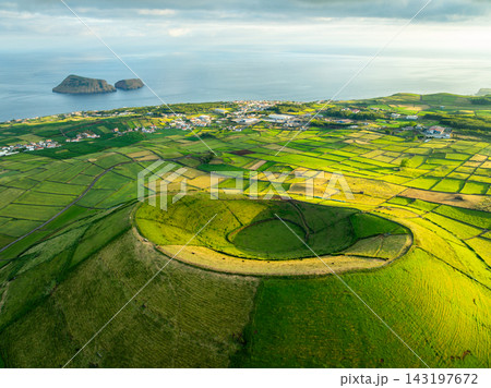 Pico Dona Joana, Lush Green Hills and Cabras Islet. Terceira Island, Azores Pico Dona Joana, Lush Green Hills and Cabras Islet. Terceira Island, Azores 143197672