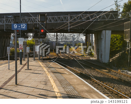 Red Railway Signal at an English Train Station Signaling Stop and Safety 143199121