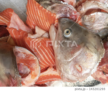 Off cuts and heads of salmon fish Off cuts and heads of salmon fish 143201293