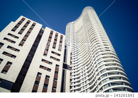 Modern urban skyline featuring a dense cluster of high-rise corporate architecture in Tel Aviv Modern urban skyline featuring a dense cluster of high-rise corporate architecture in Tel Aviv 143201891