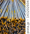 Close-Up of Steel Rebar Rods with Yellow Coating 143202604