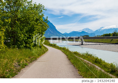 View of the river Rhine between Liechtenstein and Switzerland View of the river Rhine between Liechtenstein and Switzerland 143204140