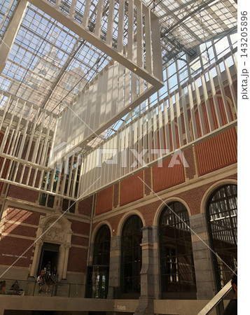 Grand modern atrium with glass ceiling, Amsterdam, Netherlands 143205896