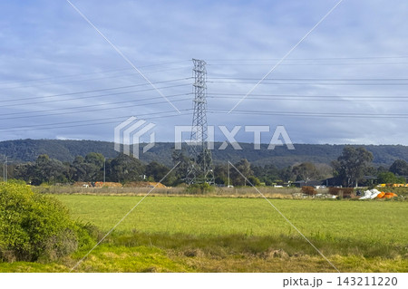 An Electrical Transmission Tower supporting High Voltage Power Lines An Electrical Transmission Tower supporting High Voltage Power Lines 143211220