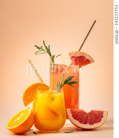 Orange and grapefruit juice with rosemary and ice. 143215753