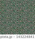 Seamless pattern with hand drawn irregular pink dots on dark green background. Abstract cute spotted texture vector illustration for fabric textile print, wrapping paper, and retro wallpaper design. 143224841