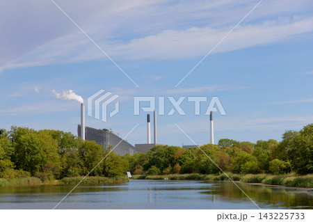 Christiania landscape overlooking the CopenHill waste-to-energy plant. Copenhagen, Denmark. Christiania landscape overlooking the CopenHill waste-to-energy plant. Copenhagen, Denmark. 143225733