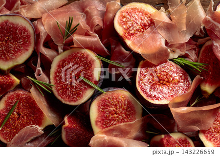 Prosciutto with rosemary and fig fruit. Prosciutto with rosemary and fig fruit. 143226659