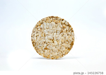 rice bread on a white background, made from rice flakes rice bread on a white background, made from rice flakes 143226738