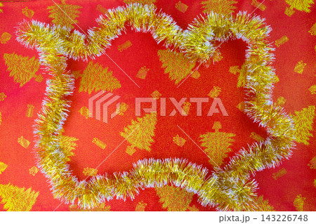 New Year's holiday fabric, red fabric with golden trees New Year's holiday fabric, red fabric with golden trees 143226748