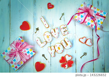 gift box on wooden table, valentine's day background gift box on wooden table, valentine's day background 143226832