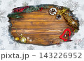 Christmas wooden background with snow branch. Top view with copy space for your text 143226952