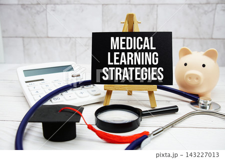 Medical Learning Strategies text with mortarboard, piggy bank, calculator, magnifying glass and stethoscope 143227013
