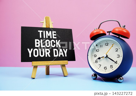 Time Changes Everything text with alarm clock on pink and blue background Time Changes Everything text with alarm clock on pink and blue background 143227272