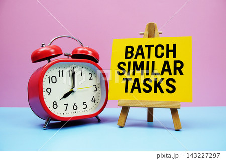 Batch Similar Tasks text with alarm clock on pink and blue background 143227297