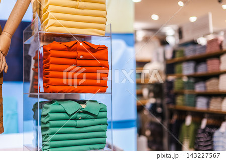 Colorful Folded Polo Shirts in Transparent Retail Display 143227567