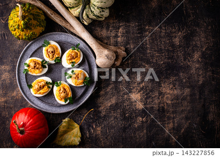 Deviled Eggs decorated with skull 143227856