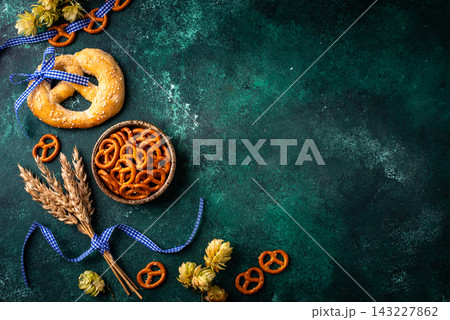 Oktoberfest background with brezel, hops and malt 143227862