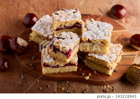 Homemade Plum Crumble Cake Bars with Powdered Sugar 143228043