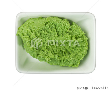 Wasabi paste in white ceramic dish isolated on white background with clipping path Wasabi paste in white ceramic dish isolated on white background with clipping path 143228117