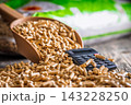 Wood Pellets And Calculator On Table Representing Biofuel Heating Costs And Renewable Energy Budgeting 143228250