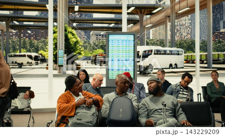 Sleepy african american group of travelers experiencing travel fatigue while waiting for interstate coach at bus station. Exhausted passengers surrounded by luggage, transportation delays. 143229209