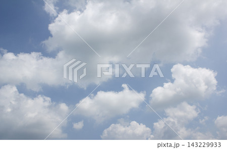 It is a blue sky with white clouds. 143229933