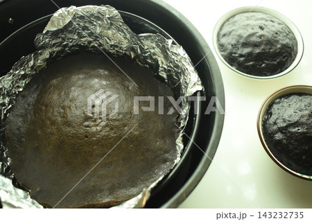 brown chocolate cake bake on aluminum foil paper 143232735