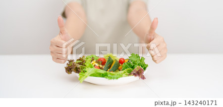 happy smiling woman with fresh organic vegetables plate and thumbs up gesture. healthy nutrition, weight loss, clean eating, Healthy food eating, Vegan, Wellness, Green dieting and Healthy lifestyle happy smiling woman with fresh organic vegetables plate and thumbs up gesture. healthy nutrition, weight loss, clean eating, Healthy food eating, Vegan, Wellness, Green dieting and Healthy lifestyle 143240171