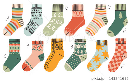 Cozy winter socks collection with Scandinavian knitted patterns, stripes, and Christmas ornaments in a flat vector style. Ideal for holiday designs and stickers Cozy winter socks collection with Scandinavian knitted patterns, stripes, and Christmas ornaments in a flat vector style. Ideal for holiday designs and stickers 143241653