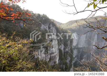 Tian-Men-Shan : Zhangjiajie China - Circa October, 2023: Landscape nature of gate of heaven orTianmen Cave in Tianmen Mountain Landmark National Park Of Zhangjiajie, Hunan , China. Tian-Men-Shan : Zhangjiajie China - Circa October, 2023: Landscape nature of gate of heaven orTianmen Cave in Tianmen Mountain Landmark National Park Of Zhangjiajie, Hunan , China. 143241980