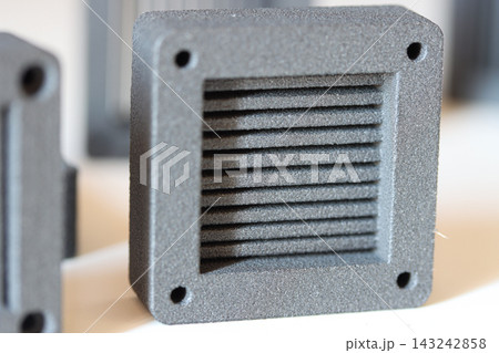 Front view of square MJF 3D printed part with ridged pattern 143242858